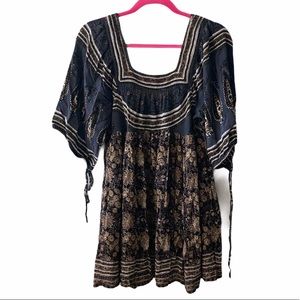 Free People beautiful cut out back blouse